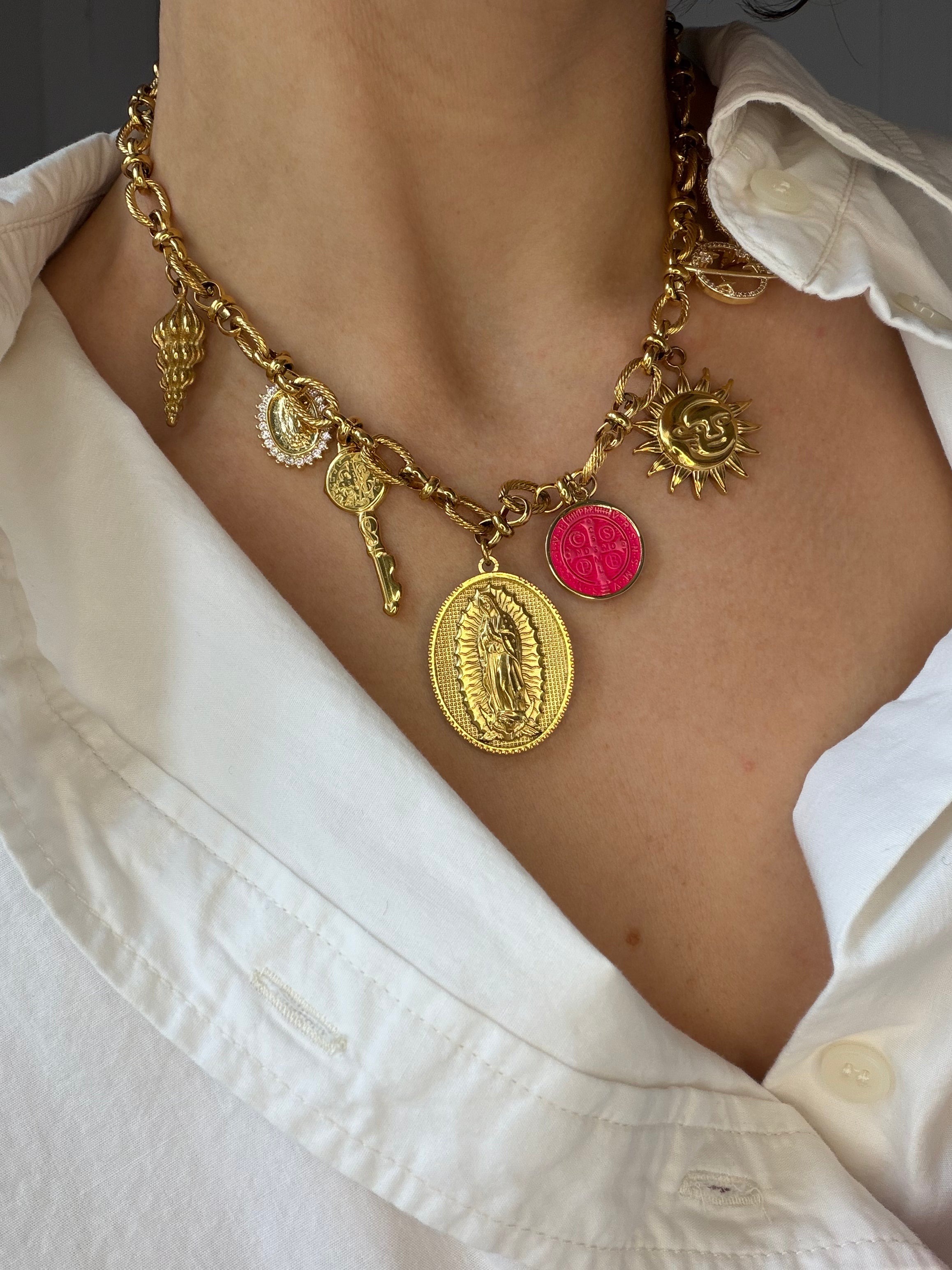 LES AMULETTES SIGNATURE™